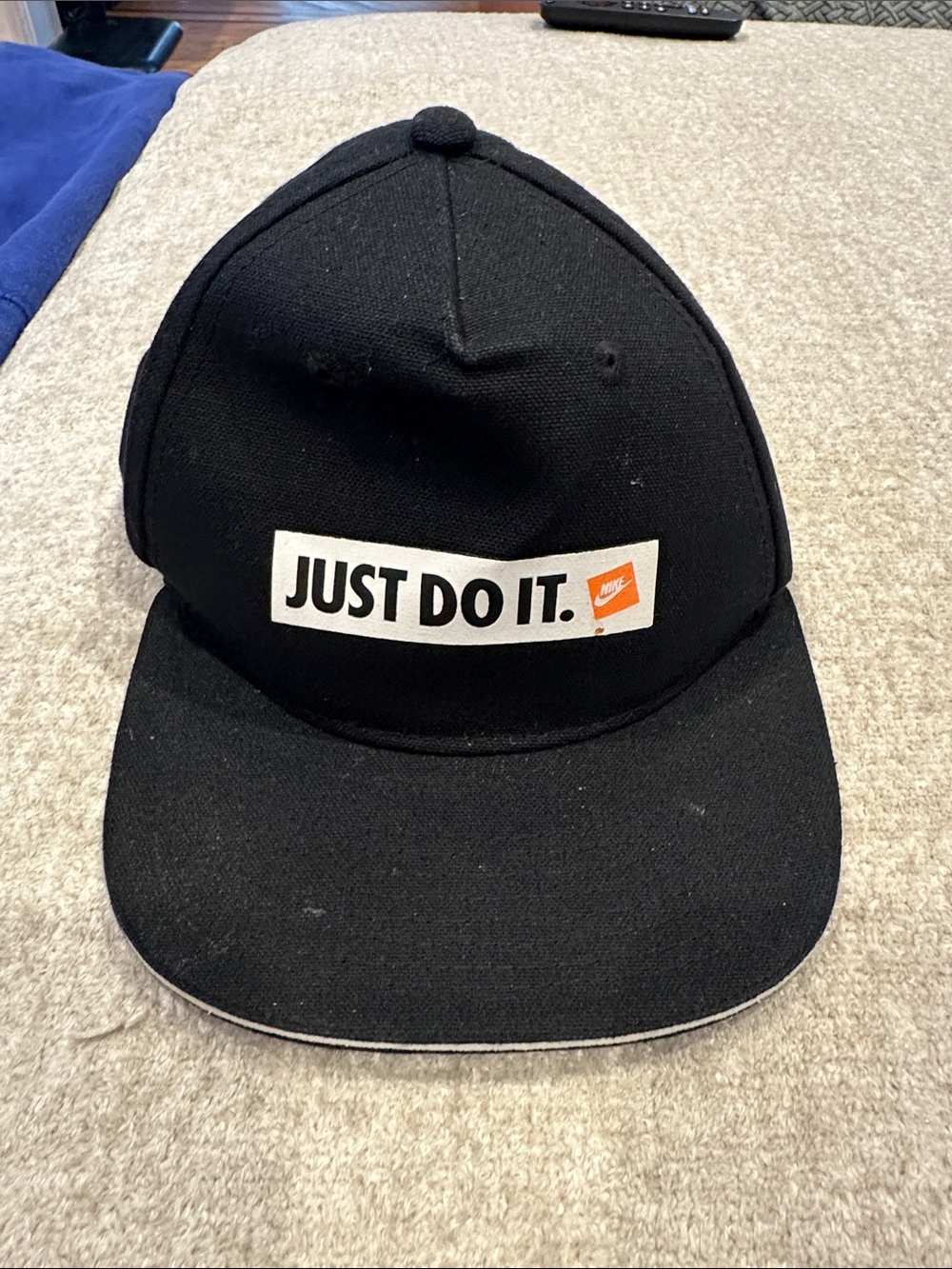 Nike Black Snapback Hat with White 'Just Do It.' Patch and Orange Swoosh